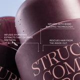 Close-up of a hair product container with text about its features.