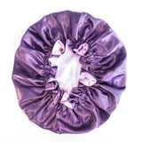 Purple satin sleeping bonnet on a white background