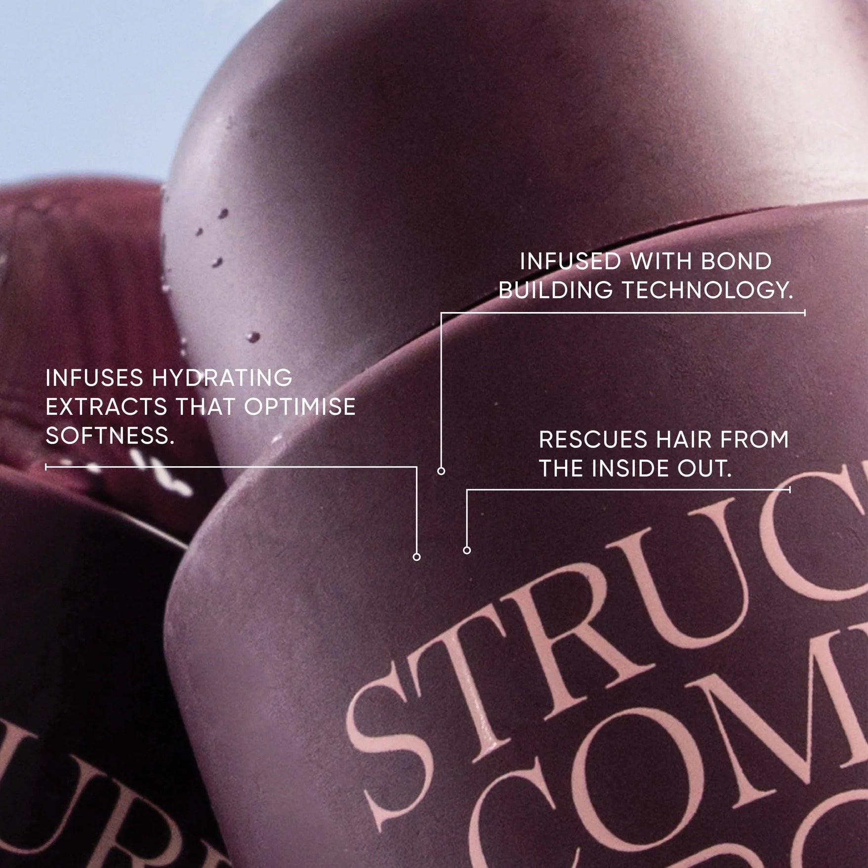Close-up of a hair product container with text about its features.