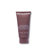 A tube of NAK HAIR Ceramide Restore Ends Leave-In Condition hair care product in a deep plum-brown color, shown on a plain white background.