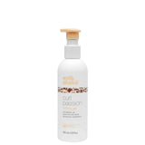 Milk Shake Curl Passion styling gel bottle on a white background